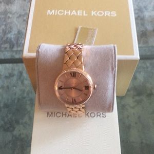 Michael Kors Women’s watch. Rose Gold toned